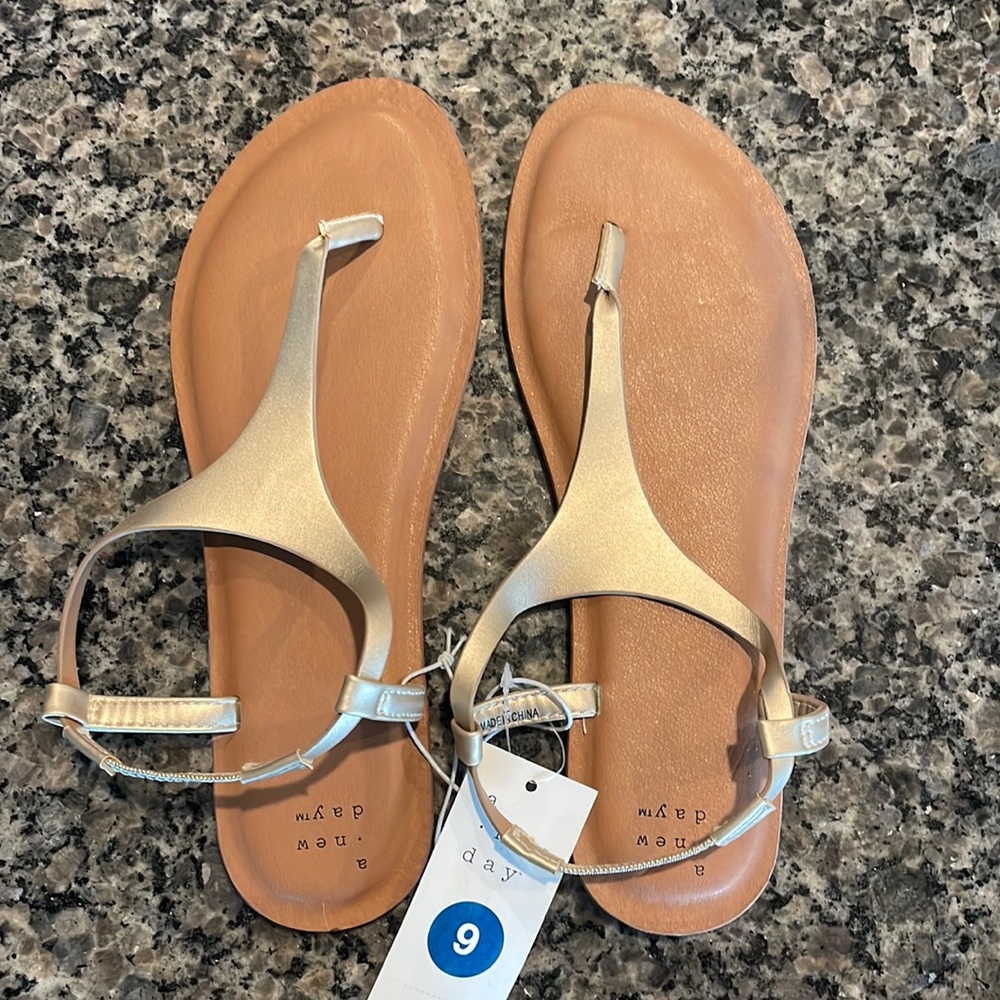Brand new gold/metallic sandals with tag.